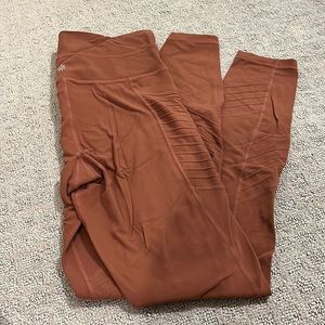 Athleta - pocketed Moto leggings size small